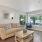 lounge with seating table and tv