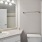 bathroom with sink mirror and shower