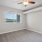 bedroom with carpet and window