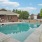 pool with a building behind it 